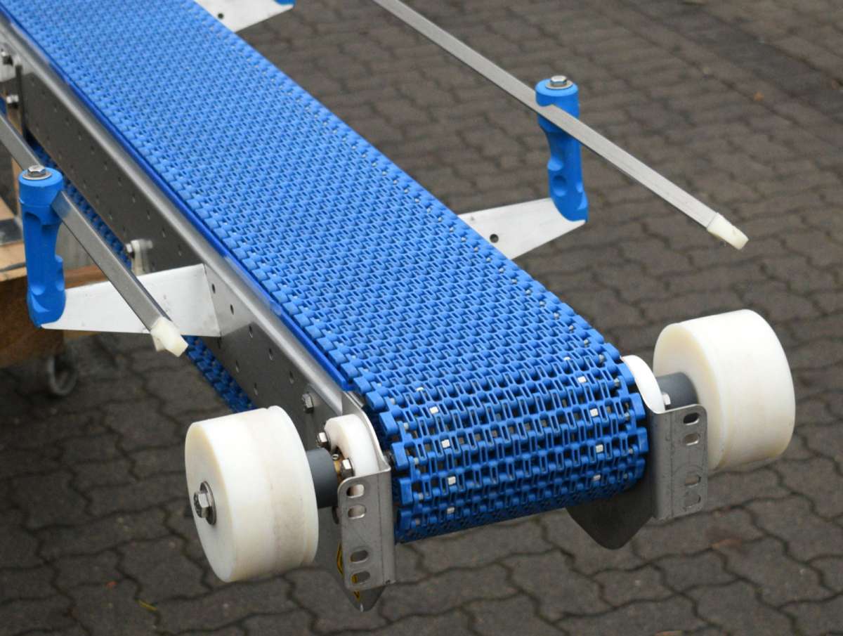 Produktbild von Mini-Förderband Aus Edelstahl – 600 Mm Bandförderer Mit 24V Motor, 85 Mm Bandbreite, Traglast 3,5-5 Kg, Für Automaten Und Frachtspuren